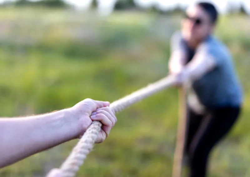 man and woman holding hands